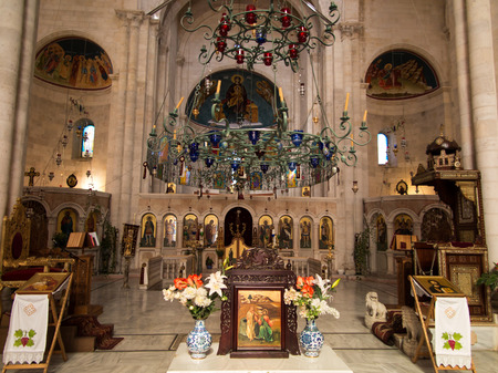 Sychar, Israel, July 11, 2015.: The interior of the church in Sychar in Samaria with the image of Jesus with the Samaritan woman at the well.のeditorial素材