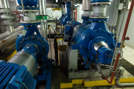 several water pumps with large electric motors
