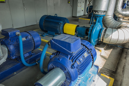 several water pumps with large electric motorsの写真素材