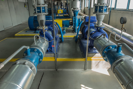 several water pumps with large electric motors