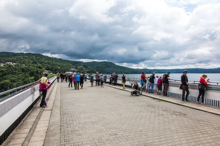 Solina, Poland -18 July 2016: The dam on the San River in Poland and the water reservoir Solina in cloudy weatherのeditorial素材