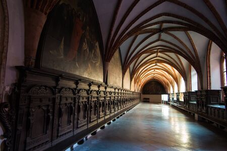 Pelplin, Poland - September 1, 2016: The cloister around an inner courtyard in the Abbey Cistercian, now the Cathedral of Pelpinie, Poland,のeditorial素材