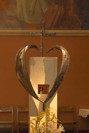 Paray Le Monial, France - September 13, 2016: Inside the chapel of the revelation of Jesus Margaret Mary Alacoque. Part of the famous mosaic and tabernacle in heart shape. Very important place for Catholicsのeditorial素材