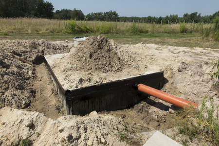 Concrete house septic tank or waste water tank from a detached houseの写真素材