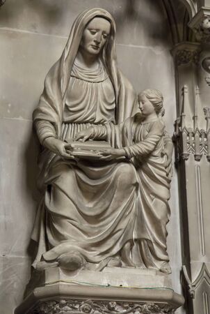 Poitiers, France - September 12, 2016: Very old church Notre Dame la Grande in Poitiers, France, in the interior of one of the side altars with a statue of the Virgin Mary with Jesusのeditorial素材