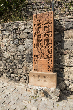 Traditional Armenian stone crosses and rocks around the Geghard monastery in Armeniaの写真素材