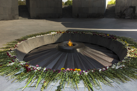 Armenian genocide memorial monument with eternal flame and flowers, in Yerevan, Armenia.のeditorial素材