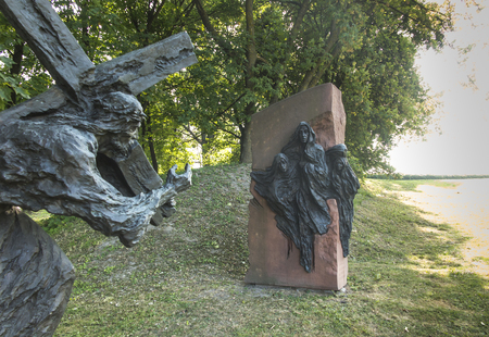 Chelm, Poland, 10 September 2018: Calvary around the Basilica of the Blessed Virgin Mary in Chelm, sculpture by Jacek Kicinski - station 8, Jesus meets the women of Jerusalem. Shrine of Our Lady in Chelm in eastern Polandの写真素材