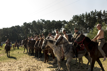 Kalety, Zielona, Poland August 31, 2019: Horse Rally along the Battle Trail of the 3rd Silesian Uhlans Regiment, grouping before swimming the horses of the Volunteer Squadron in the pond the Zielona, Polandのeditorial素材
