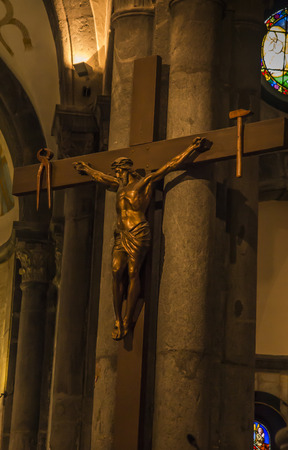 La Salette, France, June 26, 2019: Sanctuary of the Mother of God Weeping in the French Alps. Christ on the cross inside the church near the presbytery.のeditorial素材