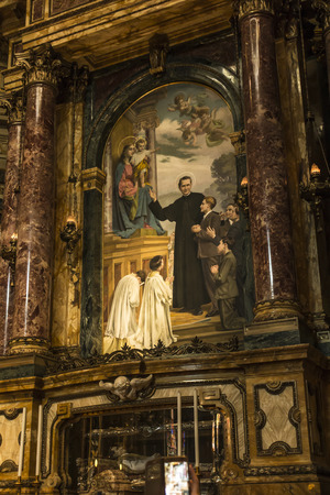 Turin, Italy, 27 June 2019: Interior of the Sanctuary of Mary Help of Christians of the Faithful in Turin, Italy. Side altar with sarcophagi and relics of Saint John Boscoのeditorial素材