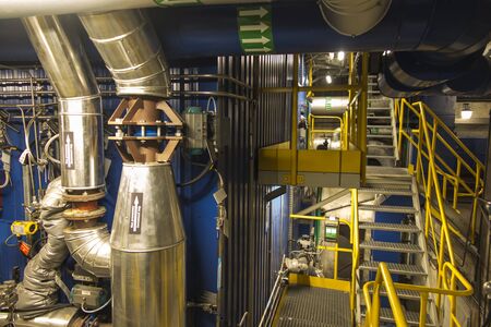 various installations mounted around the coal boiler and supporting its operation