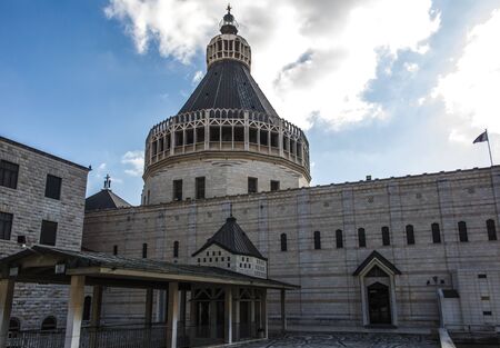 Dome of the Basilica of the Annunciation in Nazareth, Israel, against the blue skyの写真素材