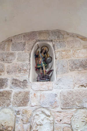 Bethlehem, Palestinian Authority, January 28, 2020: Fragment of the interior in the Milk Grotto Church in Bethlehem in Palestine. Archangel Michael fights with the dragon "who to God"のeditorial素材