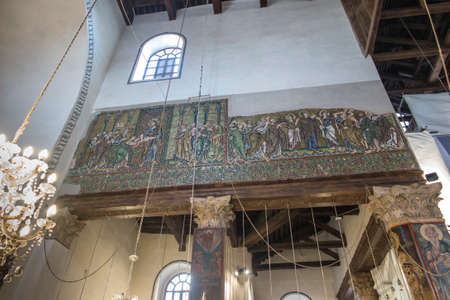 Bethlehem, Palestine - January 28, 2020: Fragment of the renovated interior of the Basilica of the Nativity in Bethlehem. Mosaics on the walls.のeditorial素材