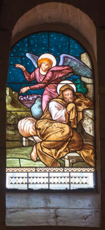 Nazareth, Israel. January 26, 2020: St. Joseph's Church, stained glass window, details. The Angel Appears to St. Joseph in a dream.のeditorial素材
