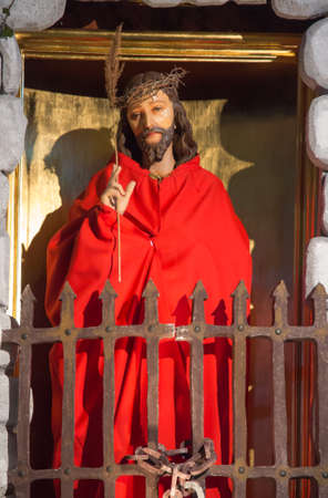 Kalety Miotek, Poland, April 2, 2021: A figure of Jesus wearing a red cloak. Decoration of Holy Thursday in the Church of St. Francis in Kalety Miotek in Poland.のeditorial素材