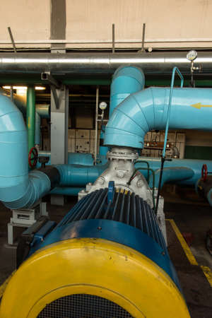 several water pumps with large electric motors