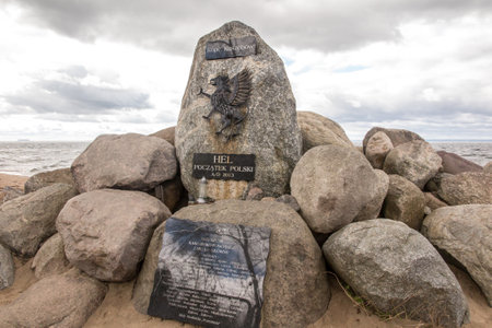 Hel, Poland, May 12, 2022: Inscriptions in Kashubian and Polish: "Kashubian Mound", "Polish Beginning" - a mound made of stones at the end of the Hel peninsula in Polandのeditorial素材