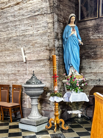 Ksiezy Las, Poland, July 1, 2023:  The  old (1494) wooden church of St. Michael the Archangel in Ksiezy Las in Silesia. Inside, the figure of the heart of the Blessed Virgin Mary.のeditorial素材