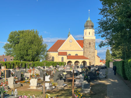 Church of St. James in Lubsza, in the Gliwice diocese, Poland. View from the cemetery.の写真素材