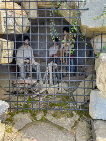 Cave with figures in the Sensory Garden in Muszyna, Poland.の写真素材