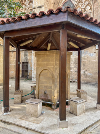 Water collection point at the Lala Mustafa Pasha Mosque in Famagusta, Cyprus. Formerly the Gothic Cathedral of St. Nicholas.の写真素材