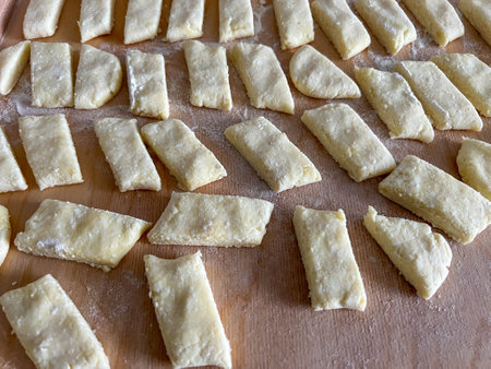 Kopytka or szagowki (Polish potato paste similar to Italian gnocchi) prepared for a home-cooked dinner.の写真素材