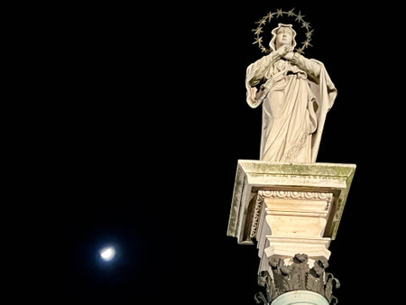 Czestochowa, Poland, March 6, 2025: Jasna Gora Monastery in Czestochowa in Poland at night, column with the Blessed Virgin Mary in front of the ramparts and wall.の写真素材