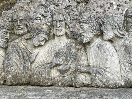 The scene of the last supper carved in the rock next to the church in the Sanctuary of Our Lady of the Rocks in Podzamcze, Ogrodzieniec in Poland.の写真素材