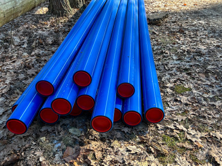 Pipes and equipment used to build a sanitary sewage system stored at the construction site.の写真素材