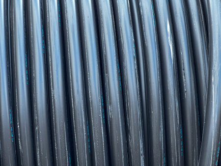 Cable on a large drum during the construction of an underground electrical network.