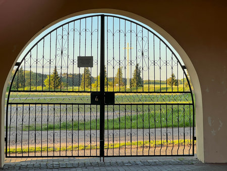 One of the gates to the garden at the Minor Basilica of Our Lady of Patiently Listening in Rokitno,...