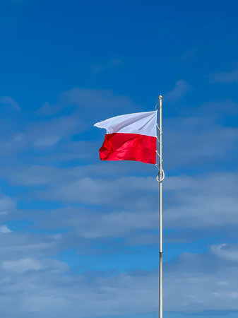 Polish flag on the beach in Kolobrzeg on the Baltic Sea in Poland.