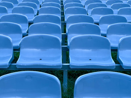 Empty plastic chairs placed in front of the field altar in the Sanctuary.の写真素材