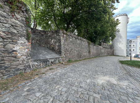 The tower at the Zabkowickie Gate in Paczkow, Poland, and the famous defensive walls in Silesia.の写真素材