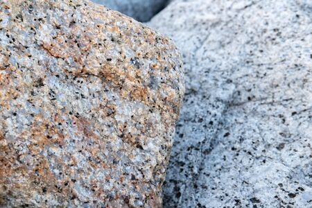 Close up. rock stone breakwater at the pier on the beach.の写真素材