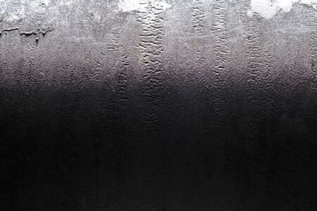 Close up. Concrete pipe surface texture in shadow and daylight mood.