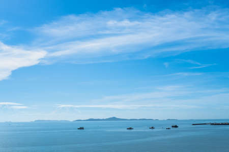 Blue sky with cloud and sea overlooking the island.の写真素材