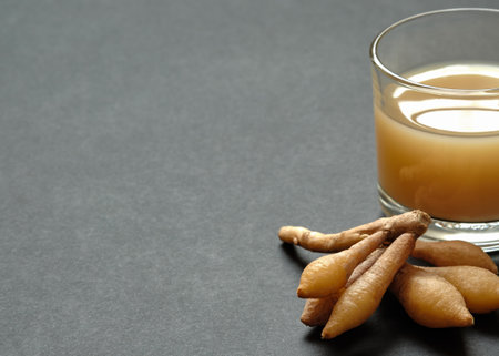 Water Extracted from Kaempferia with Fingerroot on Black Background, Copy Space for Text.の写真素材