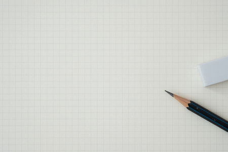 Top view, Close-up of Pencil and Eraser on Graph Paper Background, Copy Space for Text, Flat Lay...