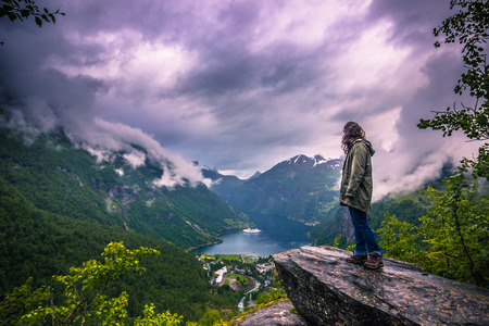 July 24, 2015: Traveller beholding the Geirangerfjord,  Norwayの写真素材