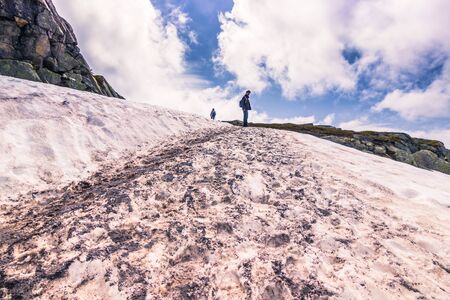 July 22, 2015: Traveller on the hiking path to Trolltunga, Norwayのeditorial素材