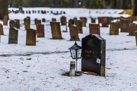 January 22, 2017: Tombstones in the Skogskyrkogarden graveyard in Stockholm, Swedenのeditorial素材