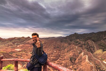 Zhangye, China - August 03, 2014: Western Tourist at the Danxia Landform in Zhangye, Chinaのeditorial素材
