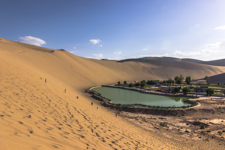 Dunhuang, China - August 06, 2014: The Crescent Lake Oasis in Dunhuang, Chinaの写真素材