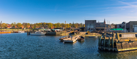 Roskilde, Denmark - May 01, 2017: Viking long boats in the harbor of Roskilde