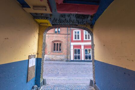 Ribe, Denmark - April 30, 2017: Toys in the ceiling of a tunnel