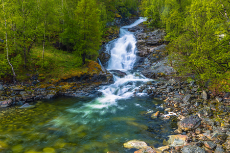 Norway - May 14, 2017: Waterfall in a village of Norwayのeditorial素材
