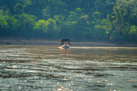 Manu National Park, Peru - August 08, 2017: Tour boat in the amazon rainforest of Manu National Park, Peruのeditorial素材